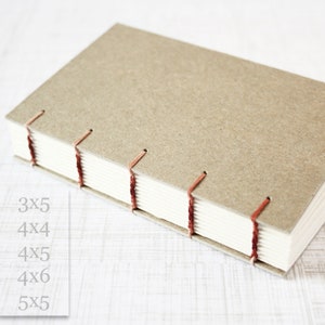 May include: A brown, handmade journal with a red thread binding. The journal is closed and lying on a white surface. The text "3x5", "4x4", "4x5", "4x6", and "5x5" is visible on the left side of the image.