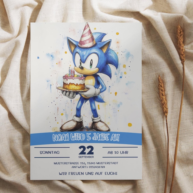 May include: A birthday invitation featuring a cartoon illustration of Sonic the Hedgehog wearing a party hat and holding a birthday cake. The invitation includes the text "Noah wird 5 Jahre alt", "Sonntag", "22 September", "AB 10 UHR", "Musterstrasse 123, 12345 Musterstadt", "Antwort: 0123456799", and "Wir freuen uns auf euch!"