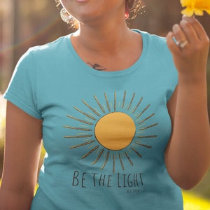Be the Light Inspirado versículo bíblico Mateus 5:14 Camisa edificante unissex camiseta de manga curta