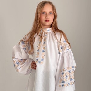 Embroidered shirt in blue and gold colors Ukrainian blouse for girls White vyshyvanka made in ukraine Boho blouse Ukrainian gift