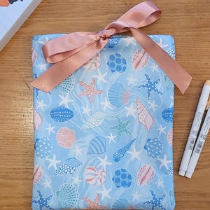 Custodia per libro tascabile Seashell