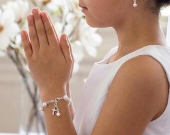 Set eerste communie parelarmband en sterlingzilveren oorbellen