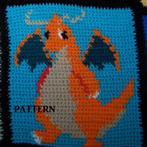 May include: A pixelated image of a cartoon orange, red, and grey dragon with black wings on a blue background. The word "PATTERN" is printed below the dragon.
