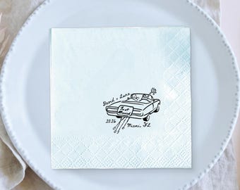 May include: Square white paper napkin with a light blue watercolor wash and a black illustration of a convertible car with the words "Just Married". The names "David + Luna", the year "2026", and "Miami, FL" are also printed.