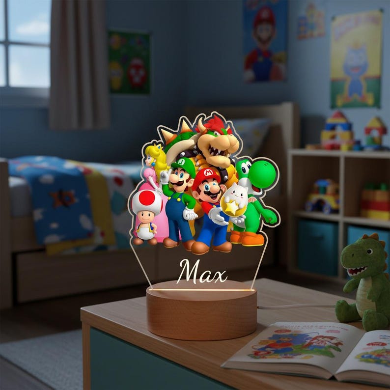 May include: A decorative night light featuring a group of cartoon characters, including Mario, Luigi, and Yoshi. The characters are in vibrant colors and are set against a clear acrylic panel. The base is made of wood, and the name "Max" is written on the panel.