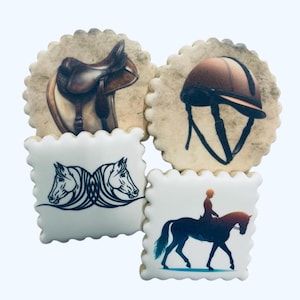 May include: Four horse-themed cookies. One cookie features a brown saddle, another a brown riding helmet. The other two cookies have horse illustrations: one with two horse heads, and the other with a rider on a horse.