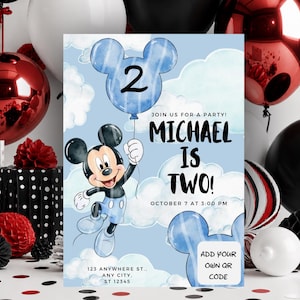 May include: A rectangular birthday invitation card featuring a light blue sky background with white clouds. Mickey Mouse holds a blue balloon with the number 2. Text reads: JOIN US FOR A PARTY! MICHAEL IS TWO! OCTOBER 7 AT 3:00 PM, 123 ANYWHERE ST..