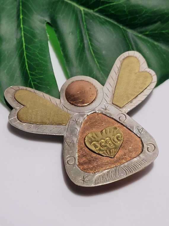 Vintage Brass Copper Silvertone Angel Peace Brooc… - image 1