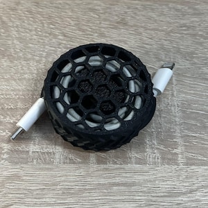 Compact cable organizer - perfect for travel and on the go