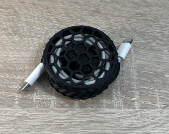 Compact cable organizer - perfect for travel and on the go