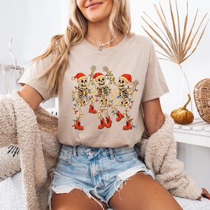Funny Christmas Skeleton T-Shirt: Dancing Graphic Tee