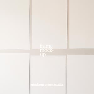 May include: A mock-up featuring six white rectangular frames arranged on a light beige background. The text "frame mock-up" is centered, with "mockora upora studio" below. The design is minimalist and suitable for showcasing artwork or prints.