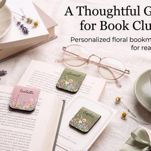 May include: Three rectangular magnetic bookmarks featuring floral designs and personalised names. One bookmark is pink with the name Isabella, while two are olive green with the names Samuel and Sophie. The text A Thoughtful Gift for Book Clubs is visible.