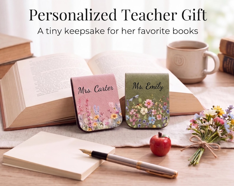 May include: Two rectangular magnetic bookmarks featuring floral prints and personalised names. One bookmark is pink with the text Mrs. Carter, and the other is green with the text Ms. Emily. Both display colourful wildflower illustrations.