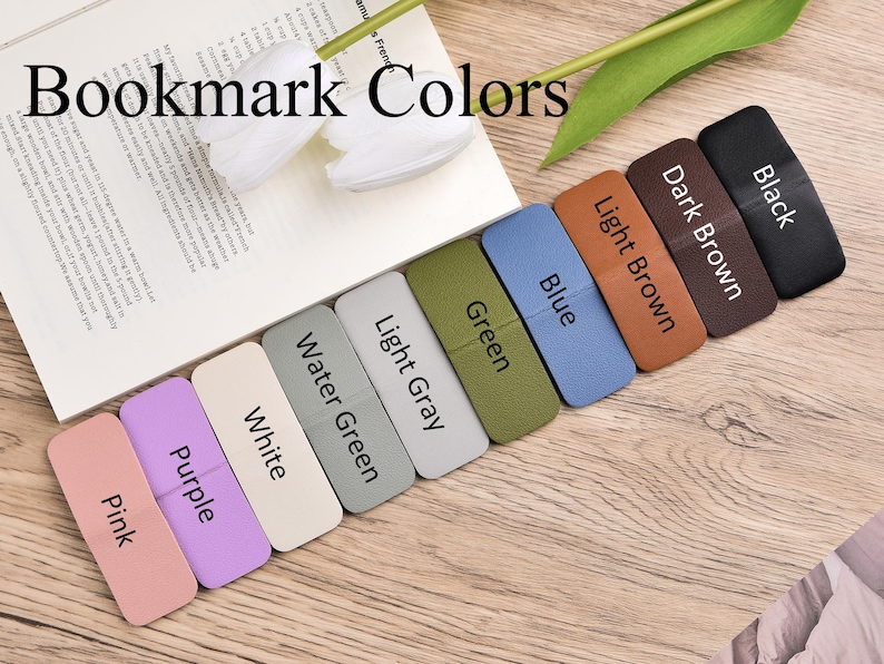 May include: A collection of rectangular magnetic bookmarks arranged in a diagonal row, labelled with colours including pink, purple, white, water green, light grey, green, blue, light brown, dark brown, and black, with the text Bookmark Colours.