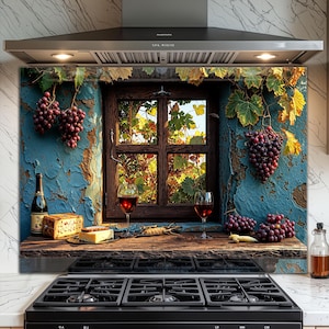 May include: A kitchen backsplash featuring a rustic window scene with red wine, grapes, and cheese. The window is framed by a weathered blue wall and adorned with grape vines. A bottle of wine and a cheese board are on the wooden ledge.