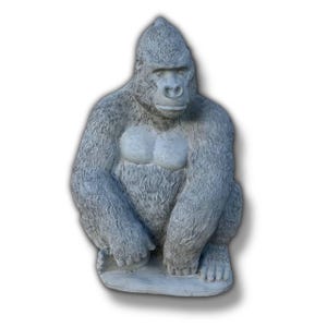 May include: A gray gorilla statue in a seated position. The gorilla has a textured, fur-like appearance with a lighter-colored chest. The statue is made of a solid material and is suitable for indoor or outdoor display.