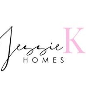 May include: A logo for a home building company called "Jessie K. Homes". The name "Jessie" is written in cursive script and the "K" is in a pink, sans-serif font.