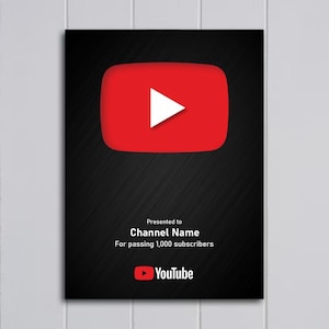 May include: A black plaque with the YouTube play button logo in red and a white triangle. Text reads "Presented to Channel Name For passing 1,000 subscribers" and the YouTube logo.