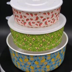 May include: A set of three ceramic mugs with a speckled, matte finish. The mugs are in shades of cream, light gray, and dark gray. Each mug has a simple, minimalist design, perfect for coffee or tea.