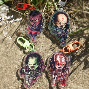 Predators 63mm keychains + stickers