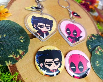 May include: Two sets of keychains featuring cartoon characters. One set features Wolverine and the other features Deadpool. The keychains are in heart-shaped frames with clear plastic. There are also two button pins featuring the same characters.