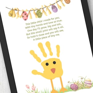 May include: A framed print featuring a yellow handprint transformed into a chick. The artwork includes a poem about a child's growth, with Easter eggs and floral accents. The print is framed in black.