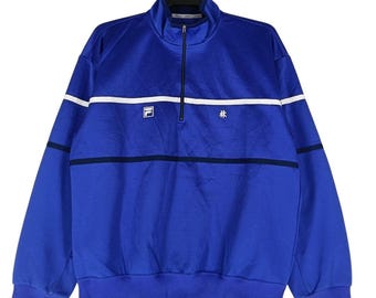 Chaqueta deportiva Fila Biella Italia azul grande vintage de los años 90. Chaqueta cortavientos con media cremallera Fila. Chaqueta deportiva talla L.
