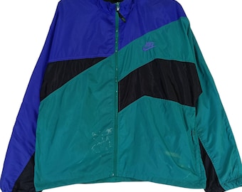 Chaqueta cortavientos Nike Swoosh multicolor mediana vintage de los años 90 Chaqueta Nike Swoosh Nike Sportswear Nike t Zip Up Talla M