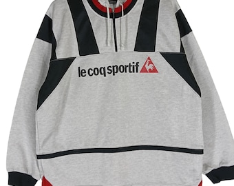 Vintage 90er Jahre Le Coq Sportif Track Top Hoodie Jacke Große Schwarz Graue Jacke Le Coq Sportif Halber Reißverschluss Le Coq Sportif Logo Jacke Größe L