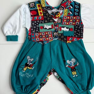 May include: A set of three ceramic mugs with a speckled, matte finish in cream, grey, and black. Each mug has a simple, modern design, suitable for coffee or tea. The mugs are stacked on top of each other.