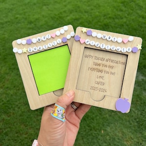 May include: Two wooden teacher appreciation frames with decorative elements. One frame has a green insert, the other has engraved text: "HAPPY TEACHER APPRECIATION! THANK YOU FOR EVERYTHING YOU DO!! LOVE, CARTER 2025-2026."