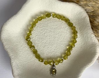 Bracelet en perles de péridot fait main avec breloque tortue en argent sterling