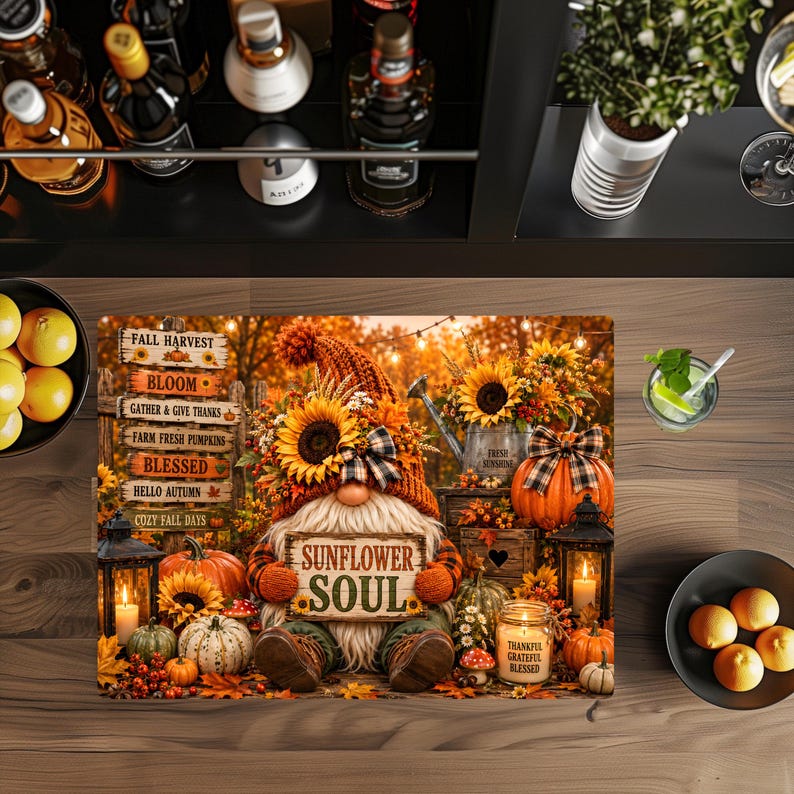 May include: A rectangular decorative mat featuring a gnome wearing a sunflower-adorned hat, holding a sign that reads SUNFLOWER SOUL. The scene includes pumpkins, lanterns, a wooden signpost with fall phrases, and sunflowers on a rustic autumn background.