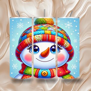 May include: Three stainless steel insulated tumblers featuring a snowman design. The snowman wears a colourful hat, scarf, and button. The background is light blue with snowflakes. Each tumbler has a silver straw.