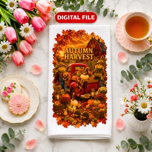 May include: A white waffle-weave kitchen towel featuring a rectangular graphic of a red pickup truck loaded with pumpkins, two scarecrows, and autumn leaves. The text AUTUMN HARVEST is printed in gold above the truck. The towel is a digital file.