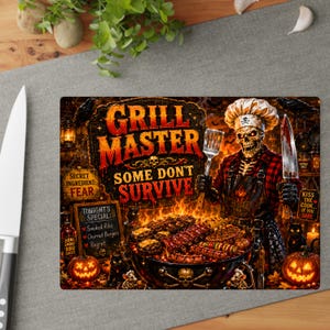 May include: A rectangular cutting board featuring a skeleton chef in a toque holding a knife and spatula over a grill. The text reads GRILL MASTER SOME DON'T SURVIVE, SECRET INGREDIENT: FEAR, and TONIGHT'S SPECIAL: Smoked Ribs, Charred Burgers, Regret.