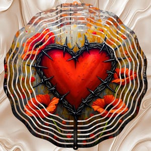 May include: A decorative metal wind spinner featuring a red heart encircled by barbed wire and accented with orange poppies. The heart design is set against a weathered wood background, with a wavy, layered border.