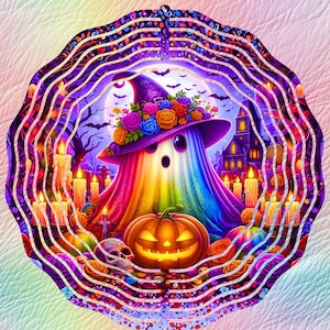 May include: A circular metal wind spinner featuring a vibrant, rainbow-colored ghost wearing a floral witch hat. The scene includes a glowing jack-o'-lantern, a skull, numerous lit candles, bats, and a dark castle silhouette against a full moon.