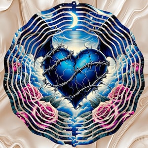 May include: A decorative metal art piece featuring a blue heart wrapped in barbed wire, with bat wings and a cracked texture. The heart is set against a backdrop of a night sky with a crescent moon, clouds, and roses.