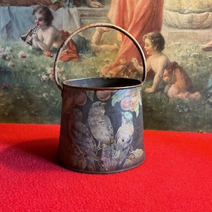 Old vintage 40/50’ beach bucket in lithographed sheet metal with cherry birds, shabby home decor