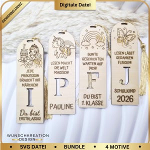 Könnte beinhalten: Vier Holz-Lesezeichen mit lasergravierten Designs. Eines zeigt eine Prinzessin, ein Einhorn, einen Regenbogen und einen Schmetterling. Jedes hat eine Quaste und Text auf Deutsch, darunter "Du bist 1. Klasse" und "Schulkind 2026".