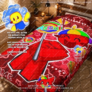 May include: A red patterned bedspread featuring a large central graphic of a cartoon character with a yellow and green hat, a lollipop, and a sandwich. The design includes repeating star shapes and the text "team cool" in a bold, dark font.