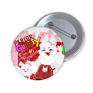 Puede incluir: Un botón redondo con un personaje de dibujos animados con gorro de chef y delantal, sosteniendo un helado. El botón tiene el texto "PARIOR GUBBY" y "Free Popsicles" sobre un fondo rosa y rojo.