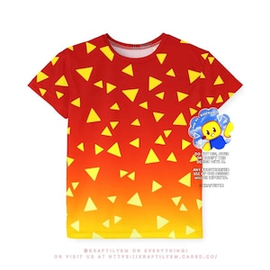 May include: A short-sleeve t-shirt featuring a red-to-yellow gradient background with a scattered pattern of yellow triangles. A circular logo with a cartoon character and text is on the right side, with additional text at the bottom.