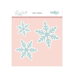 May include: Three die-cut snowflakes in light blue with white outlines are displayed on a pink background. The top of the card has text that reads "diciembre" and "3 PIEZAS / TROQUELES". The brand name "Mintopia" is also visible.