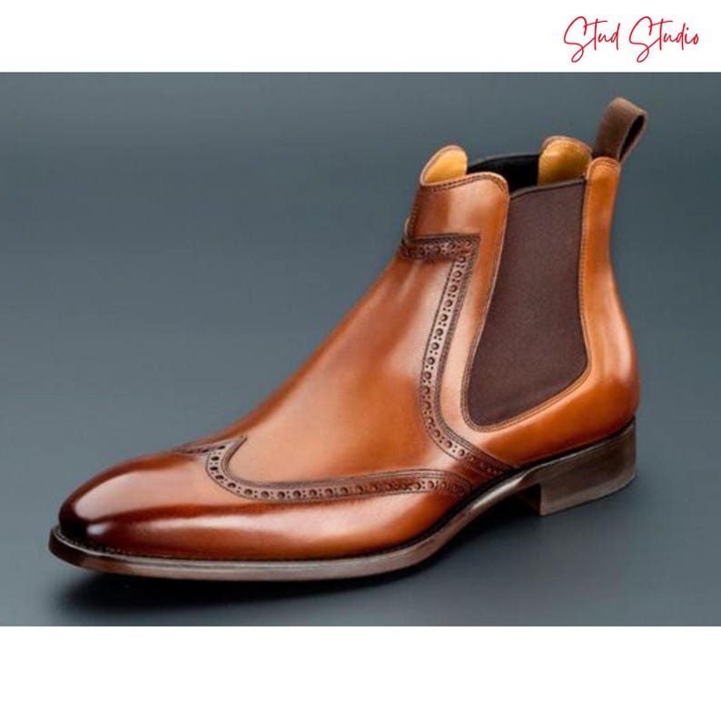 Handcrafted men’s leather boots with smooth full-grain leather, sturdy stitched sole, and timeless design for formal and casual wear.