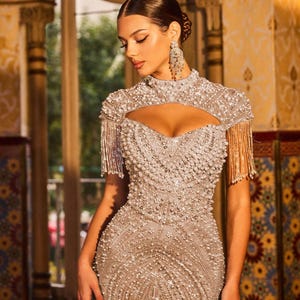 champagne colored mermaid dress with transparent shoulders Champagne Beaded Off-Shoulder Mermaid Gown 48137