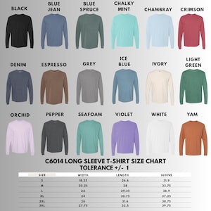 Pu&ograve; includere: Una tabella colori che mostra diciotto magliette a maniche lunghe in varie tonalit&agrave;, tra cui nero, blue jean, blue spruce, chalky mint, chambray, cremisi, denim, espresso, grigio, ice blue, avorio, verde chiaro, orchidea, pepe, seafoam, viola, bianco e yam.