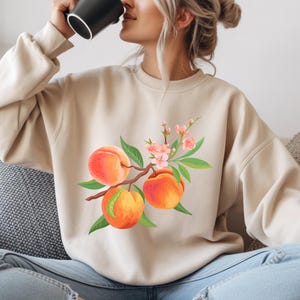 Peach Blossom Sweatshirt – Aesthetic Fruit Floral Crewneck & Hoodie – Cute Spring Fall Pullover – Unisex Sizing